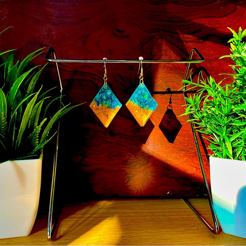 Handcrafted gold and turquoise resin earring.